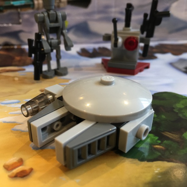 LEGO microscale model of  the Millennium Falcon. This version uses a single 4 x 4 radar dish to form the top of the Falcon.