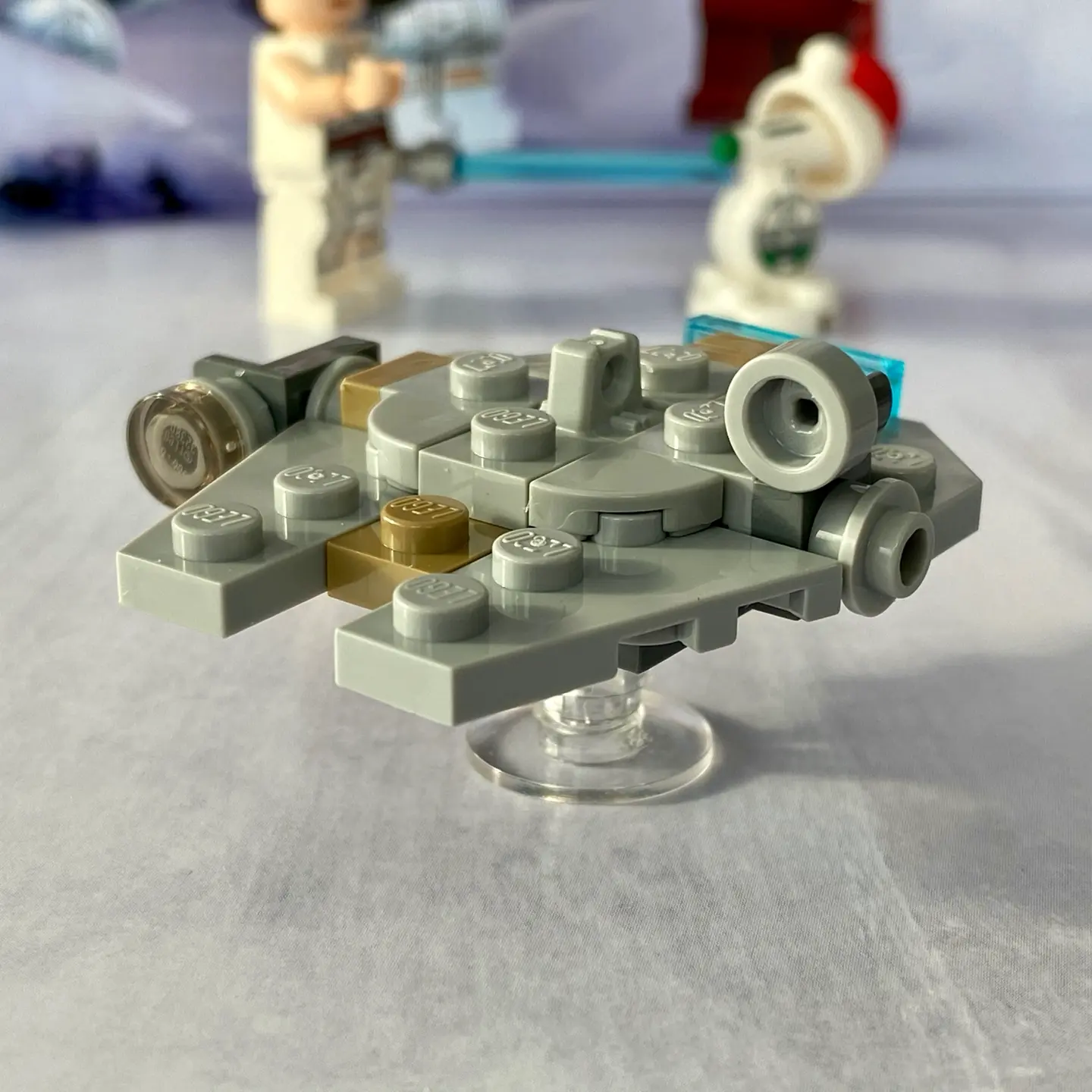 LEGO microscale model of  the Millennium Falcon. This version is built from stacked plates making it very thin and flat like a pancake.