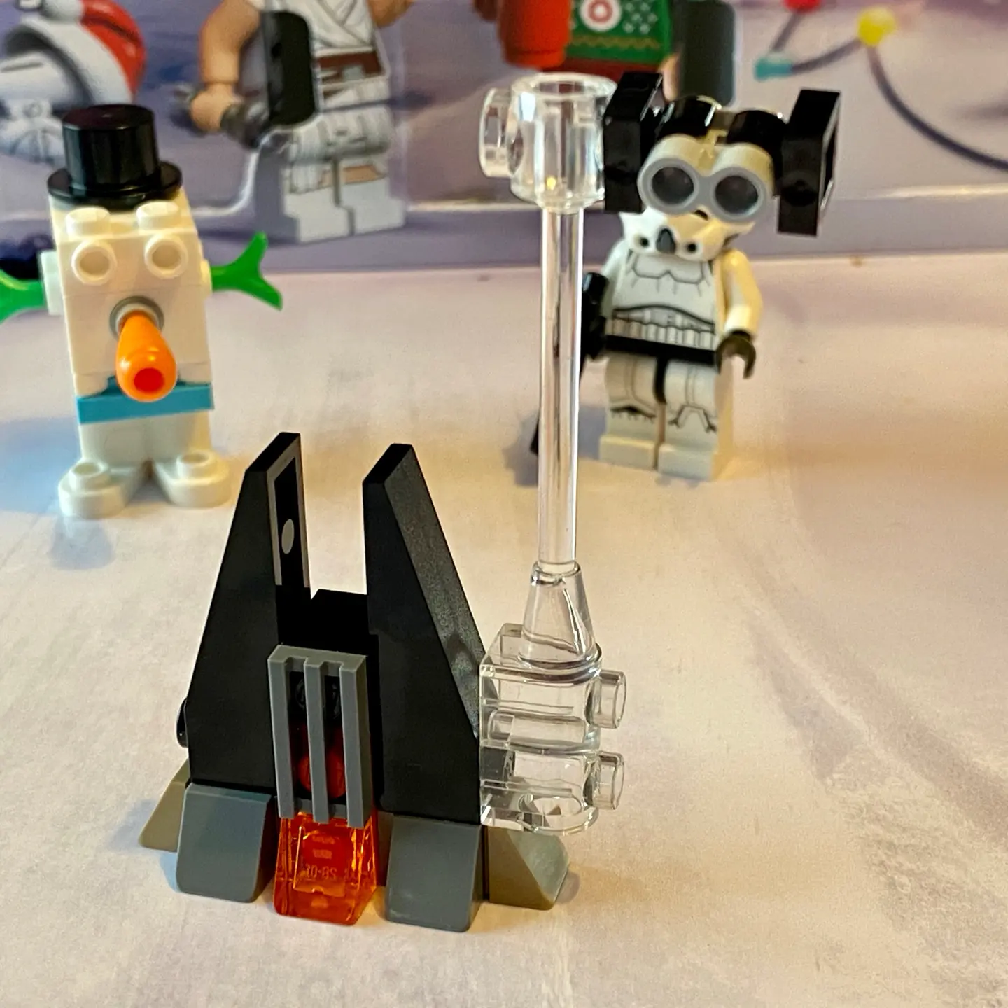 LEGO micro-scale build of Darth Vader's castle and his personal TIE fighter. The castle and ship are mostly black.