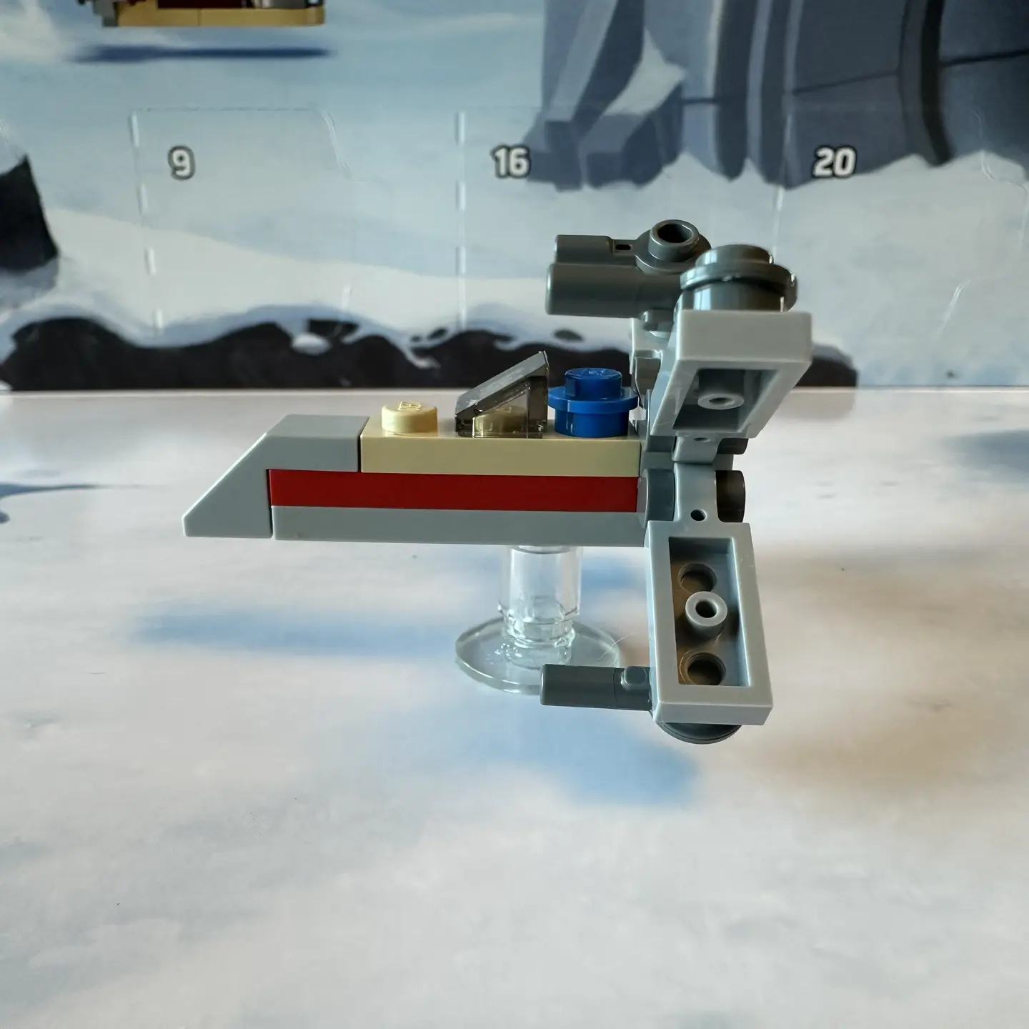 Side-on view of LEGO microscale X-Wing