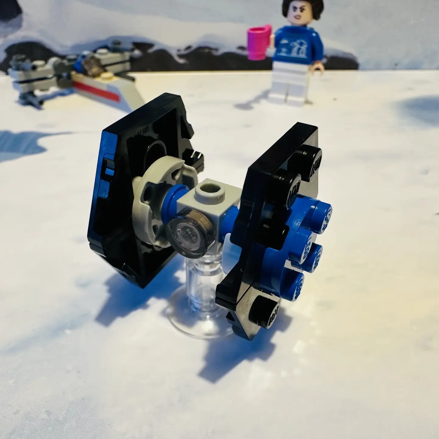 LEGO microscale TIE Fighter with blue highlights on the wings